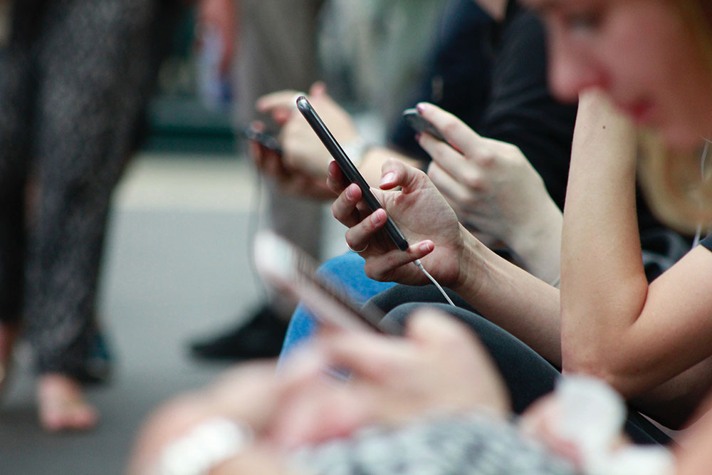 people holding phone